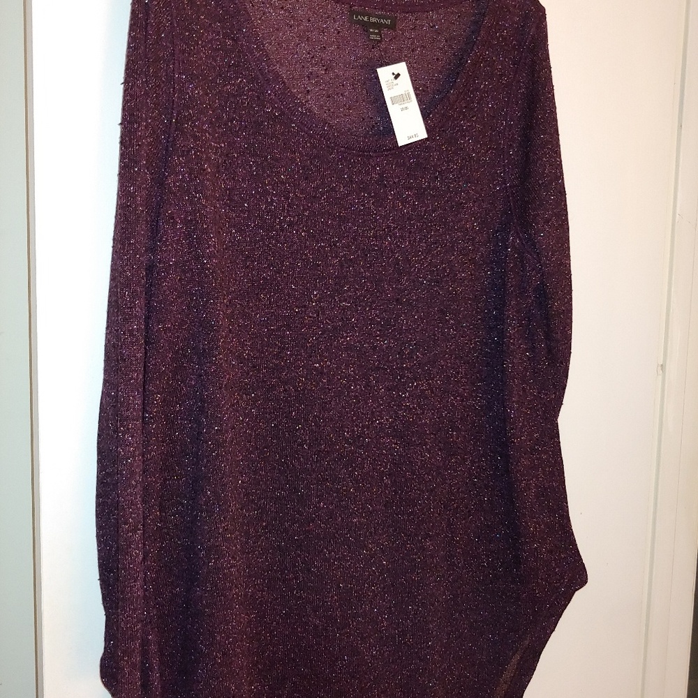 Long sleeve top W/left drop hem